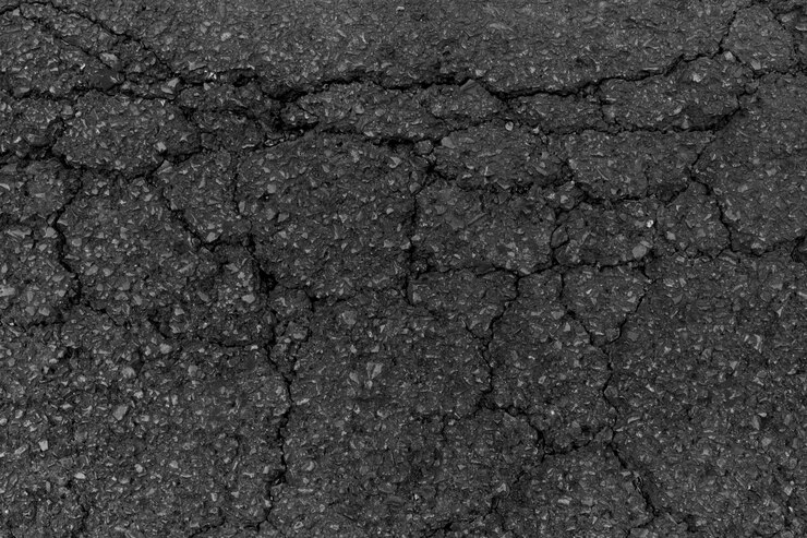 Dark Slightly Cracked Asphalt Road Texture