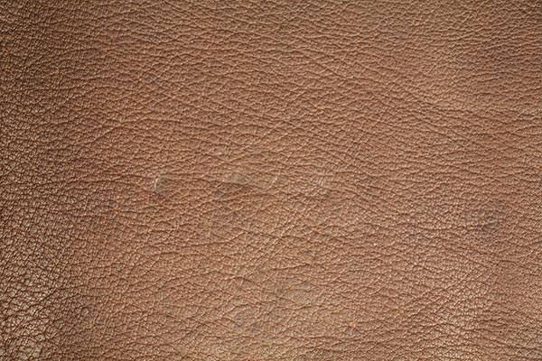 tan-leather-texture-dented-patterned-material-soft-book-cover-wallpaper