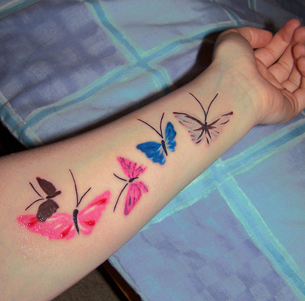 colored-butterfly-tattoos-on-left-forearm