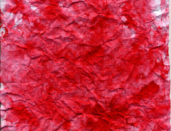 Crumpled and Creased Red Paper Texture