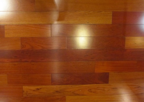 red wood texture with bright plank cherry flooring reflection