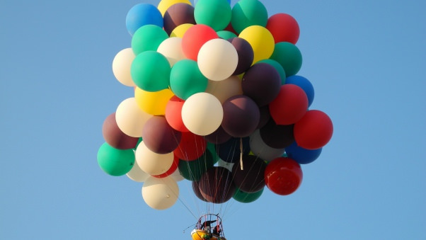 Colorful Baloons Under Blue Sky Background