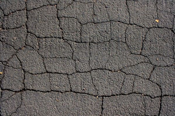 Cracked Black Top Asphalt Pavement Texture