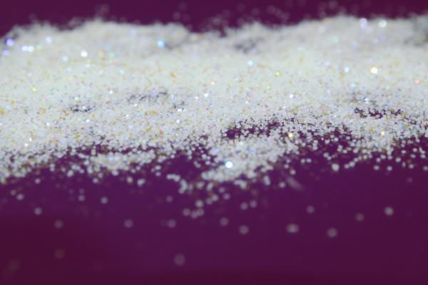 Scatted White Glitters Background