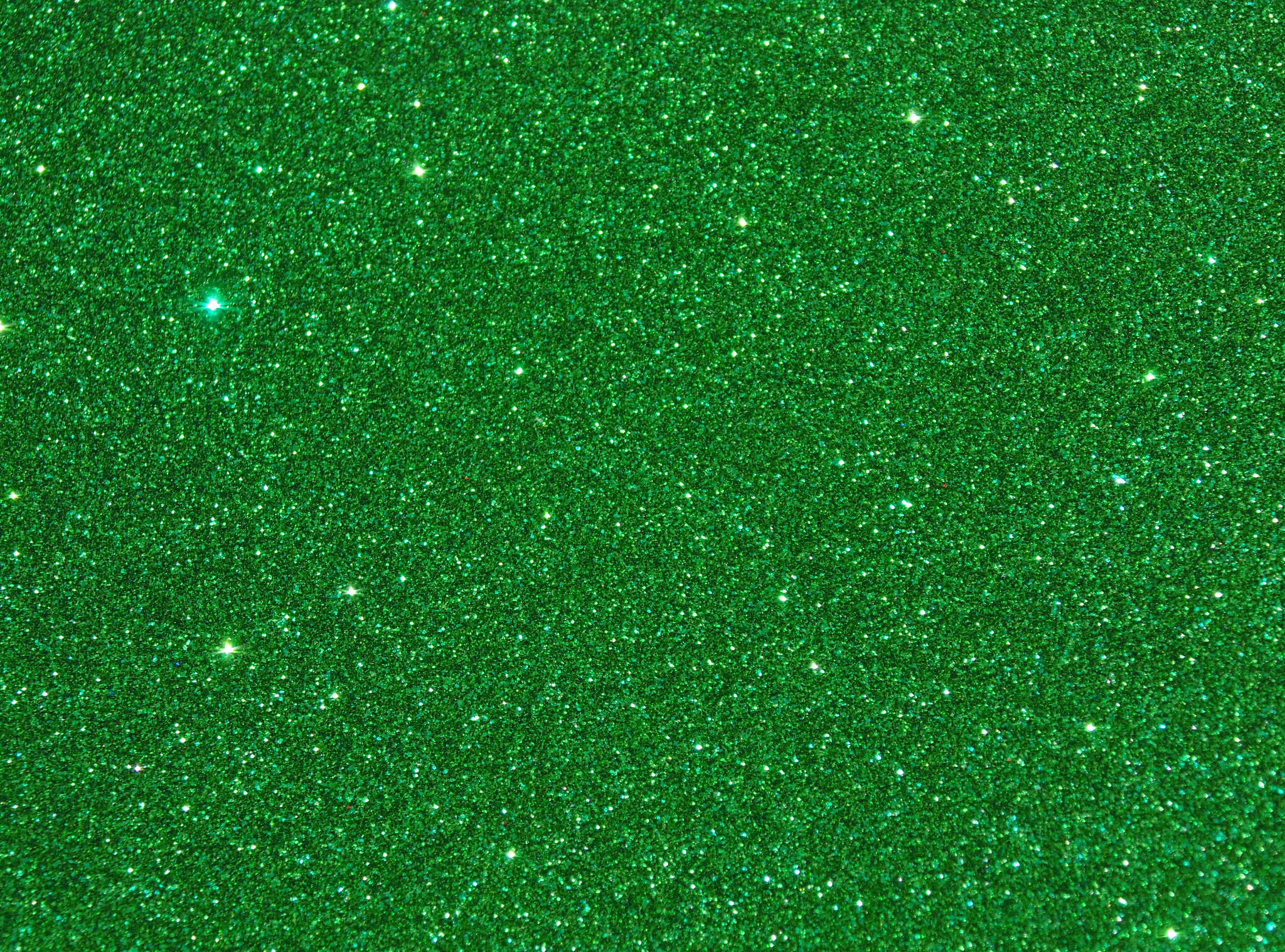 Sparkles Glitters on Green Background