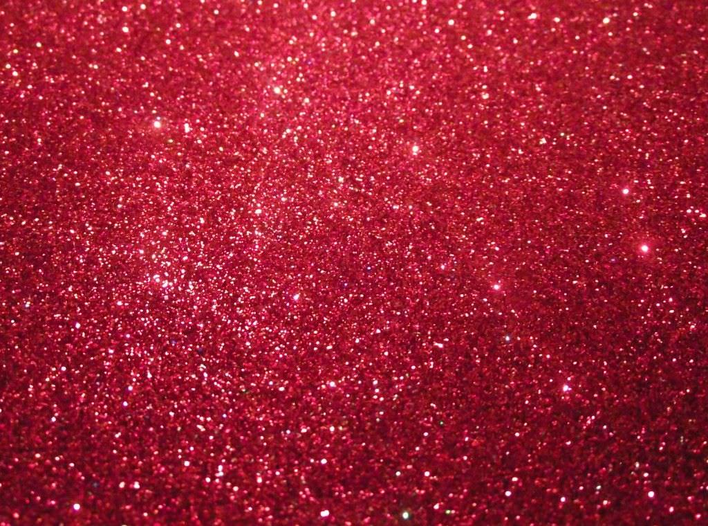 Twinkling Red Glitter Background
