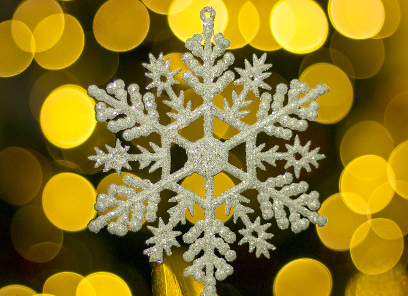 Yellow Snowflakes Bokeh Background