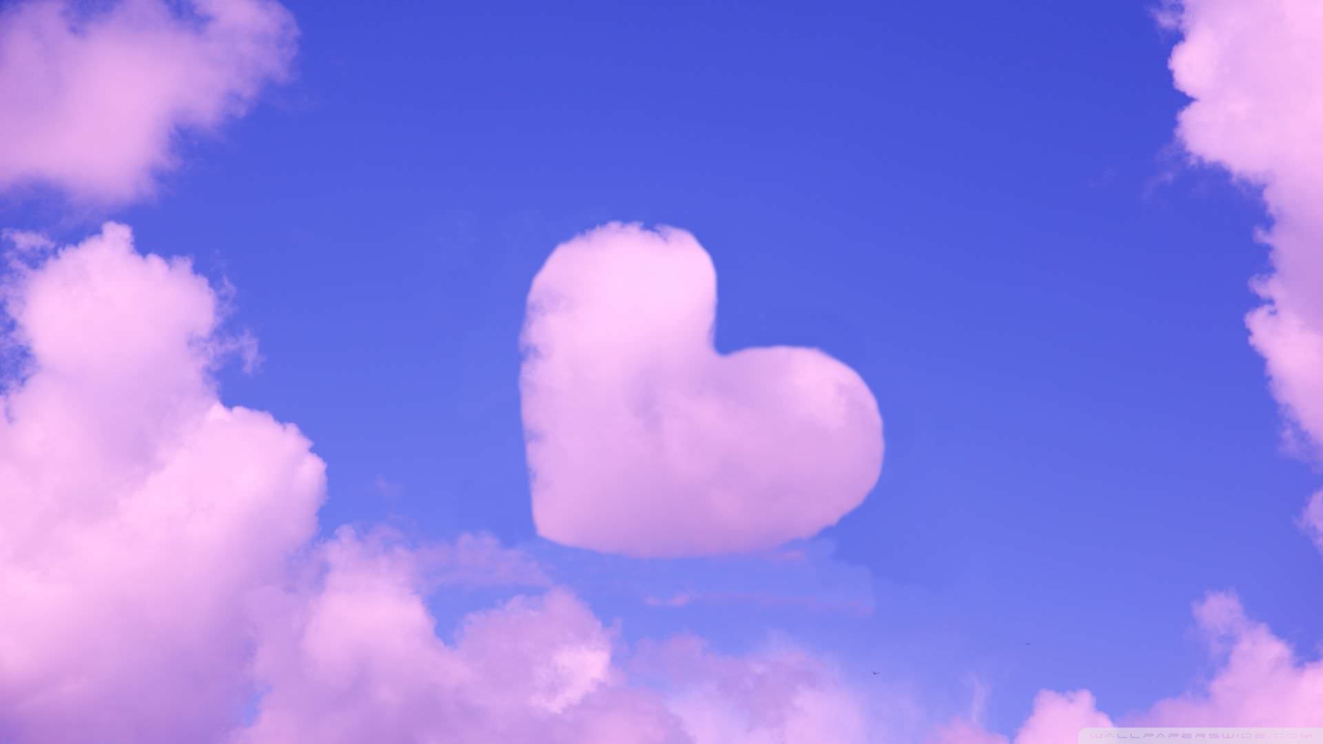 Pink Heart in Sky Background