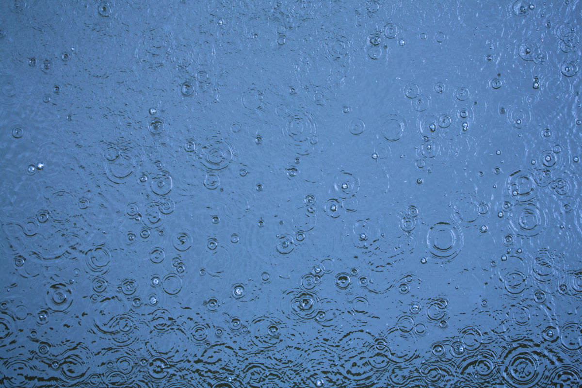 Rain Drop Ripples On Water Texture