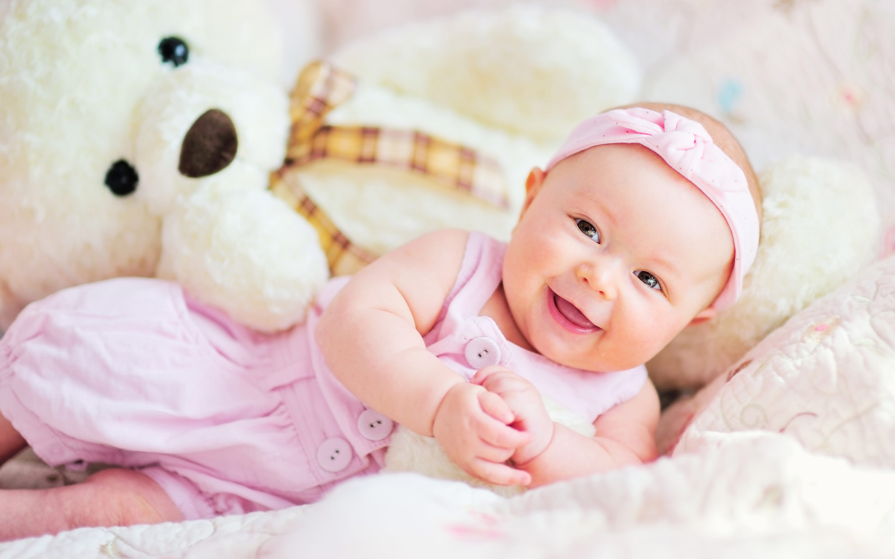 Cute Baby with Teddy Bear Wallpaper