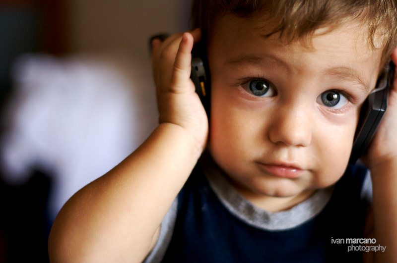 Kid With Headphones Photo