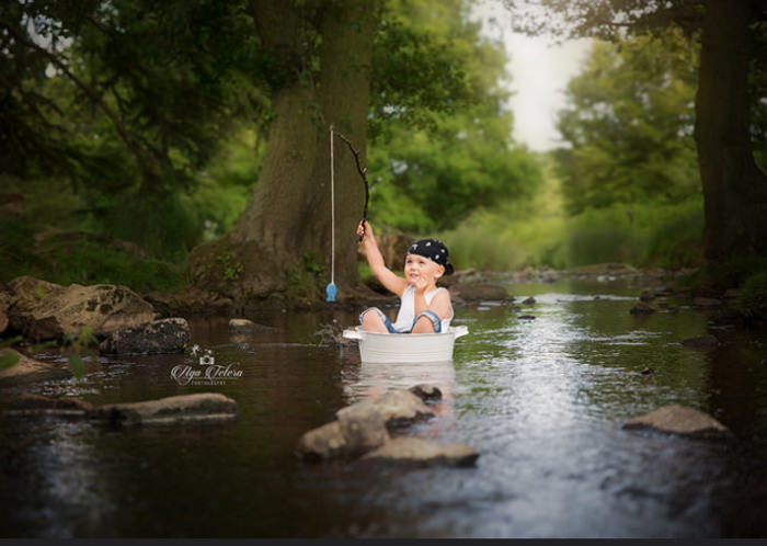 Little Boy In Water Photo