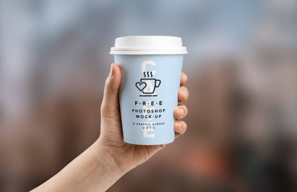 Photoshop Coffee Cup In Hand MockUp